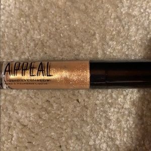 New. Appeal liquid eyeshadow in gold.